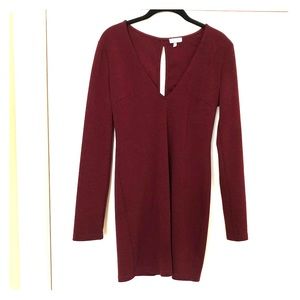 Fitted wine colored long sleeve v-neck dress